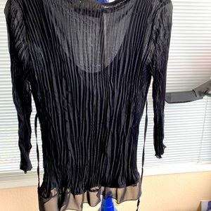 Cute dressy blouse worn one time.